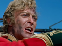 Lt. Gonville Bromhead (Michael Caine) orders his troops to fire in Zulu (1964), Diamond Films