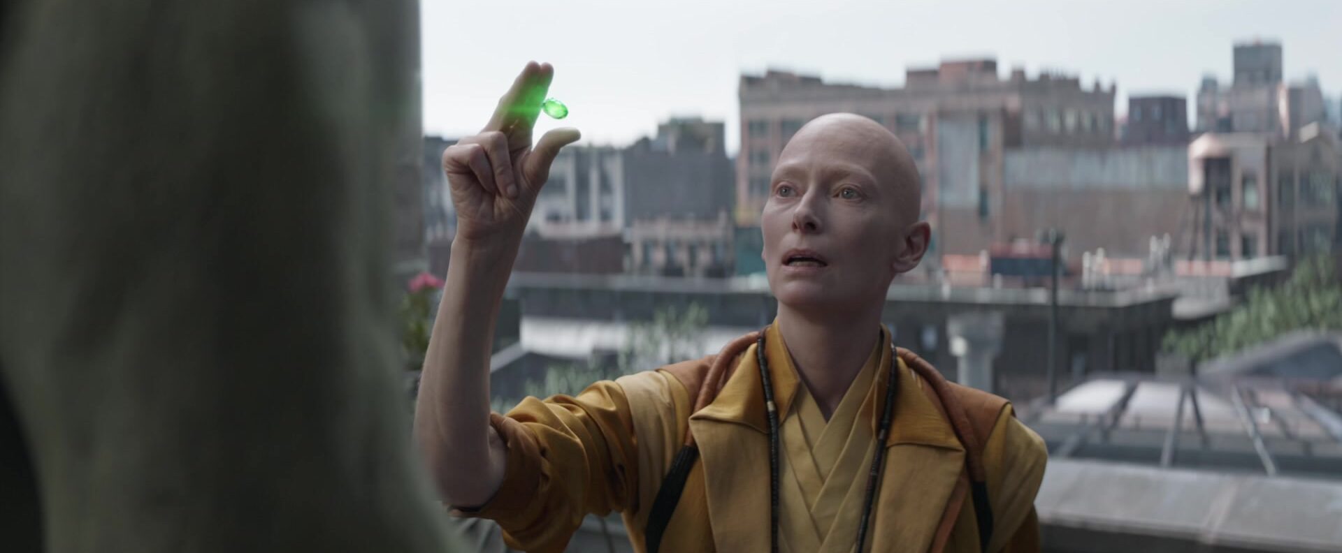 The Ancient One (Tilda Swinton) offers the Time Stone to the Hulk ()Mark Ruffalo) in Avengers: endgame (2019), Marvel Entertainment