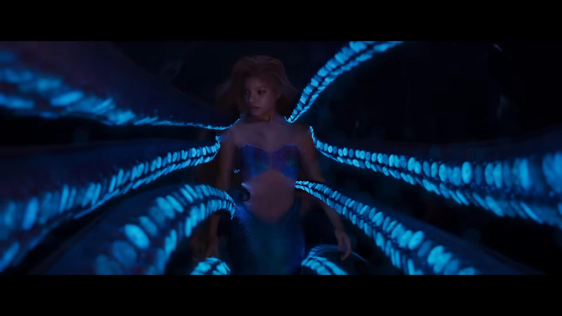 Ariel (Halle Bailey) prepares to make a deal in The Little Mermaid (2023), Disney