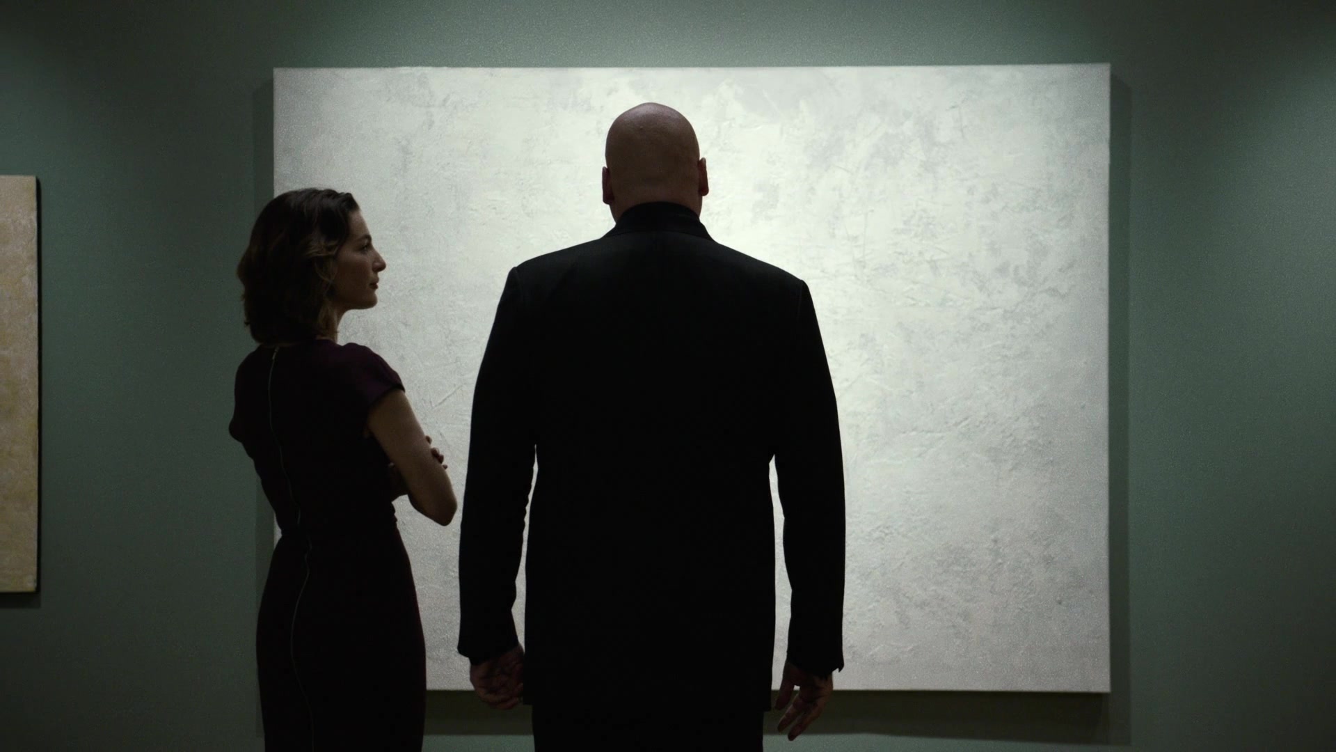 Vanessa Marianna (Ayelet Zurer) notices Wilson Fisk (Vincent D'Onofrio) take interest in a particular painting in Daredevil Season 1 Episode 3 "Rabbit in a Snowstorm" (2015), Marvel Entertainment