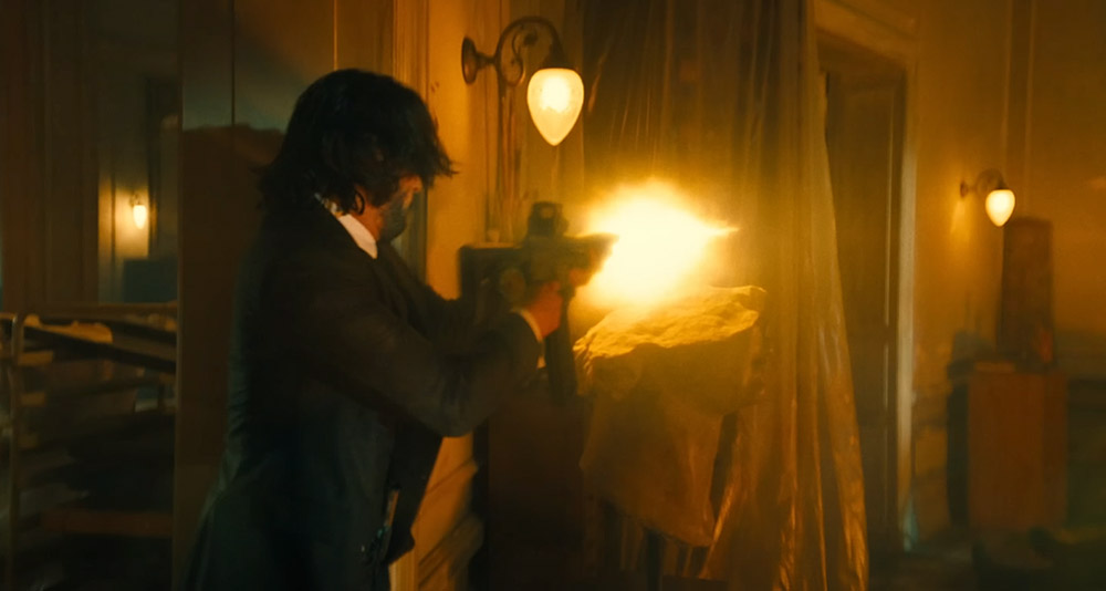 John fires a Dracarys with Dragon's Breath rounds in 'John Wick 4' (2023), Lionsgate