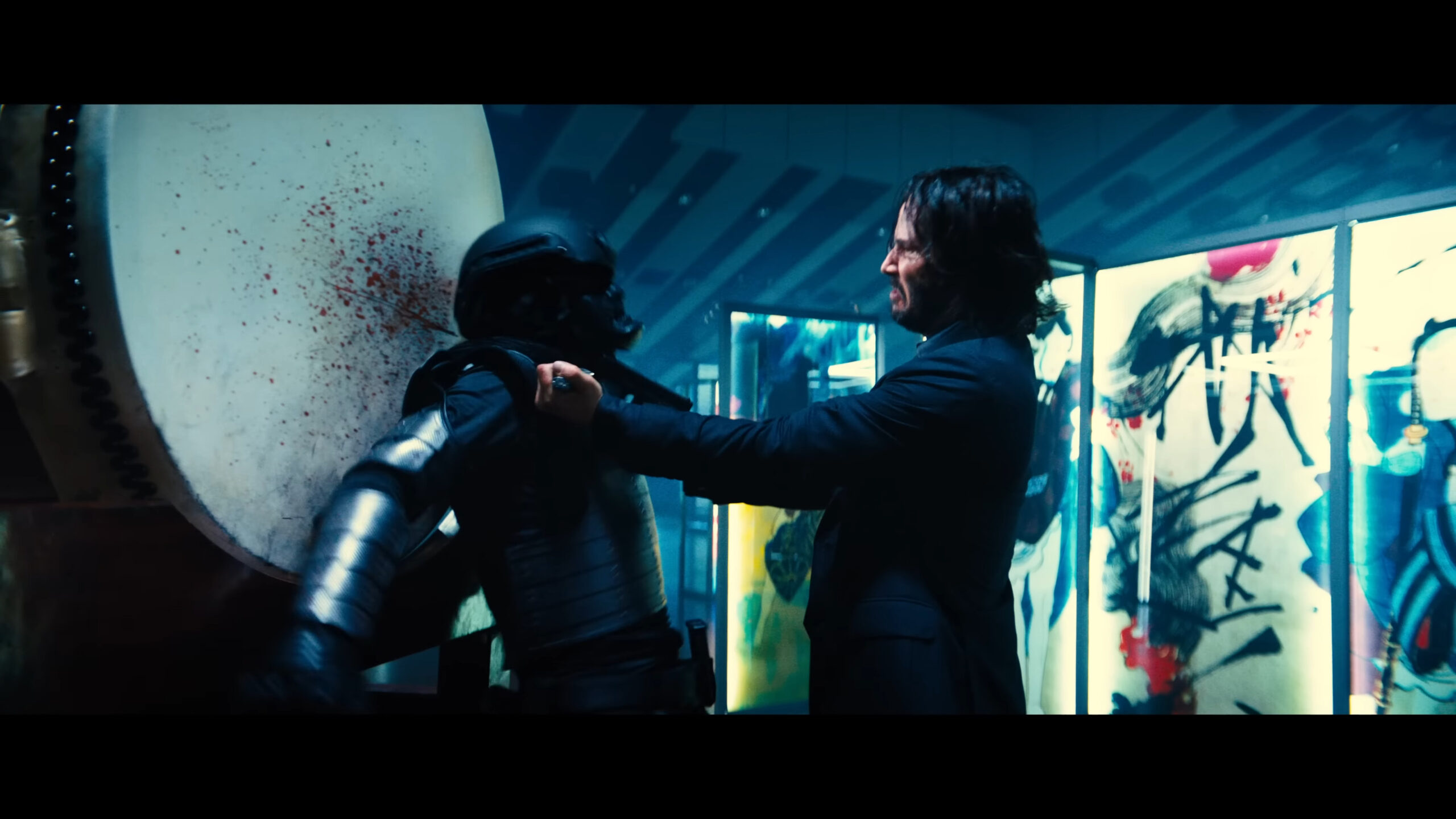 John Wick (Keanue Reeves) pulls the trigger in John Wick: Chapter 4 (2023), Lionsgate Films