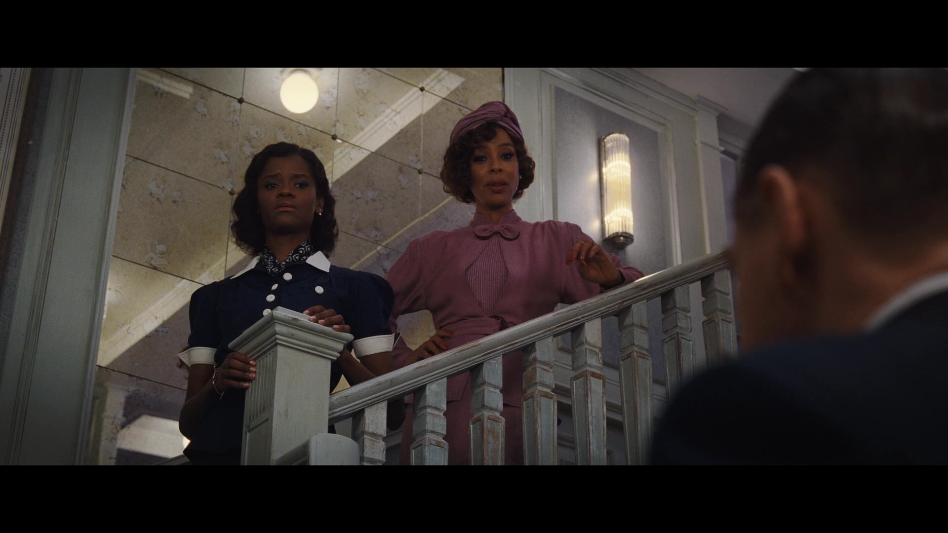 Salome Otterbourne (Sophie Okonedo) and her niece Rosie are interrogated by Hercule Poirot (Kenneth Branagh) in Death on the Nile (2022), 20th Century Studios 