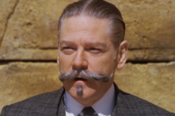 Hercule Poirot (Kenneth Branagh) solves a mystery at Jerusalem's Western Wall in Murder on the Orient Express (2017), 20th Century Studios