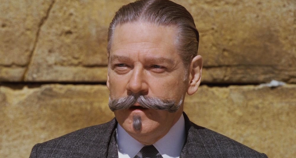 Hercule Poirot (Kenneth Branagh) solves a mystery at Jerusalem's Western Wall in Murder on the Orient Express (2017), 20th Century Studios