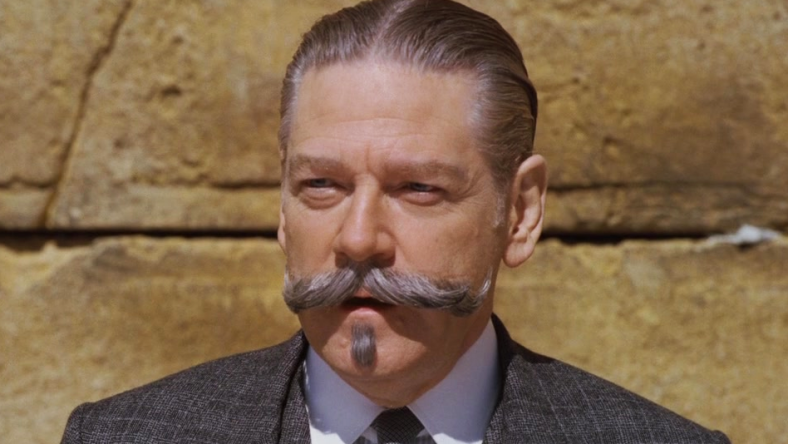 Hercule Poirot (Kenneth Branagh) solves a mystery at Jerusalem's Western Wall in Murder on the Orient Express (2017), 20th Century Studios