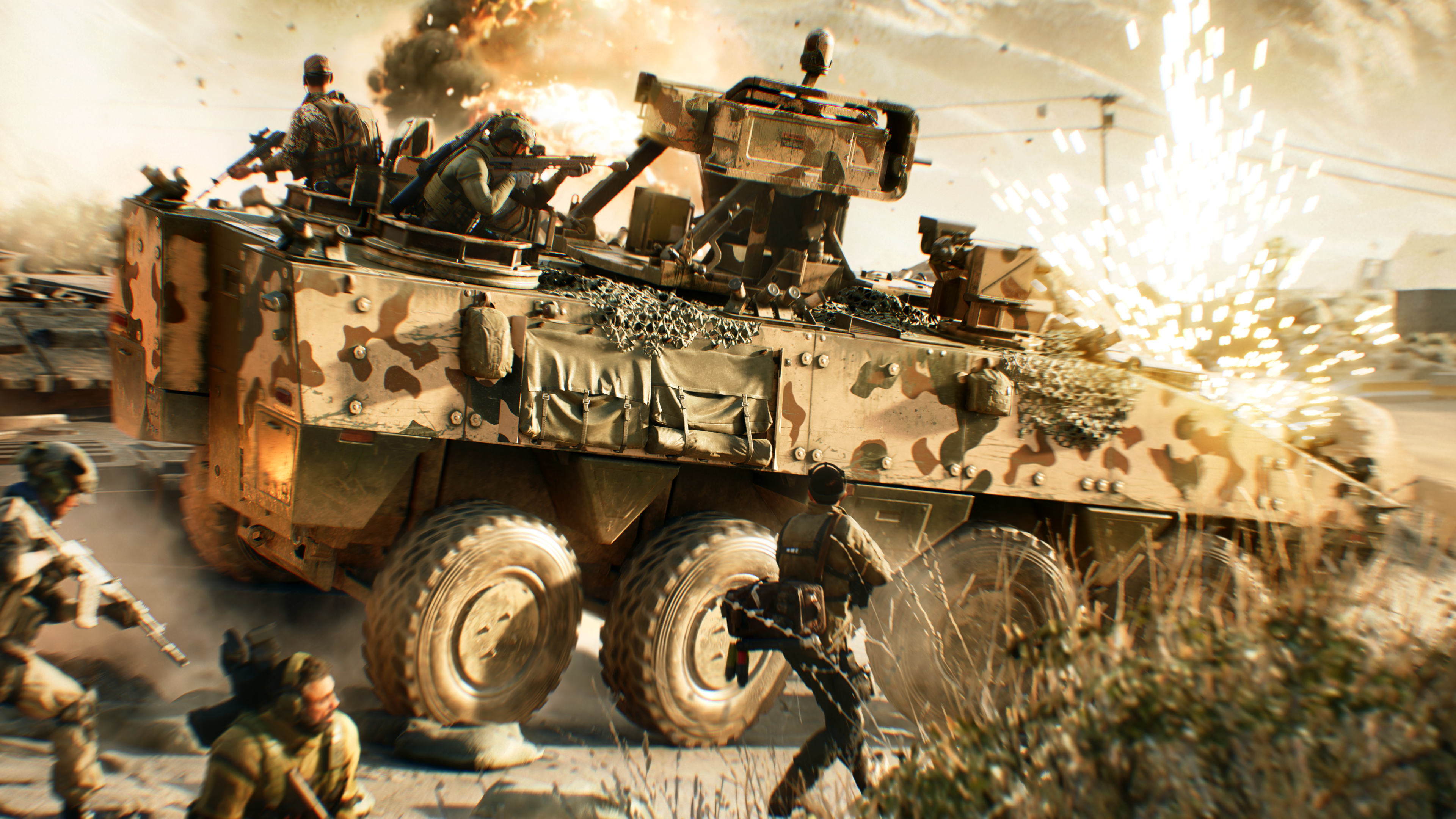 An APC rolls forward as explosions go off all around via Battlefield 2042 (2021), Electronic Arts