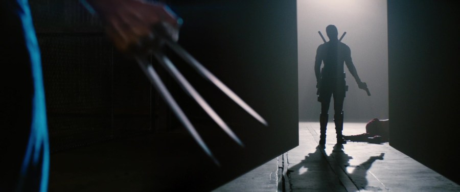 Deadpool (Ryan Reynolds) does Wolverine (Hugh Jackman) a favor in Deadpool 2 (2018), Marvel Entertainment
