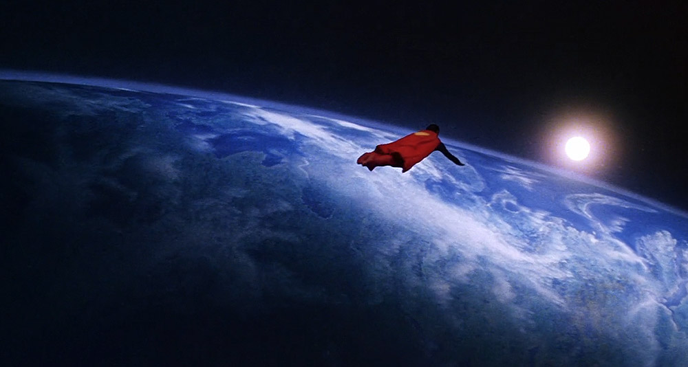 Superman soars over the planet Earth in the 1978 film by Warner Bros.