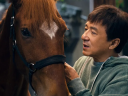 Luo Zhilong (Jackie Chan) and his horse Red Hare in Well Go USA's Ride On.