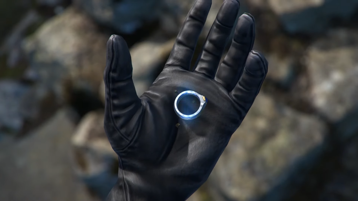 An unknown Ring of Power sits in a gloved hand via The Lord of the Rings: Heroes of Middle-earth (2023), EA
