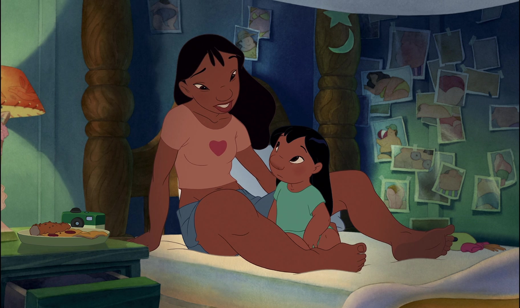 Nani (Tia Carrere) comforts Lilo (Daveigh Chase) in Lilo & Stitch (2002), Walt Disney Studios