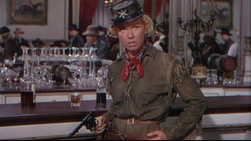 Calamity Jane (Doris Day) takes no guff at the Deadwood saloon in Calamity Jane (1953), Warner Bros. Pictures