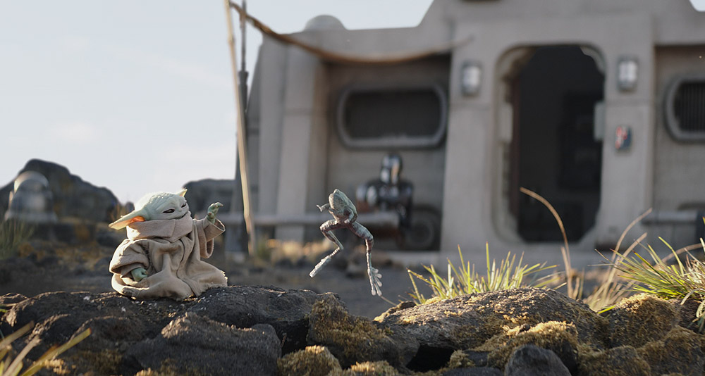 Grogu plays with a frog on Nevarro in 'The Mandalorian' (2023), Disney+
