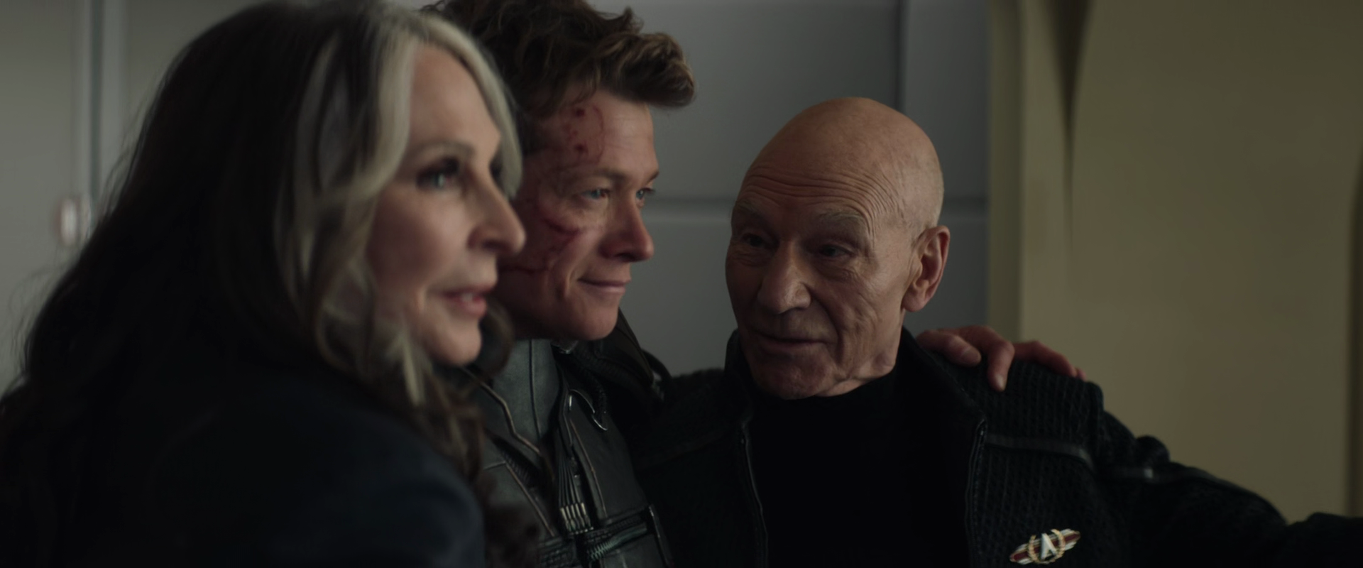 Picard (Patrick Stewart), Beverly (Gates McFadden) and Jack (Ed Speelers) stand united as a family for the first time in Star Trek: Picard Season 3 Episode 10 "Et in Arcadia Ego: Part 2" (2023), Paramount