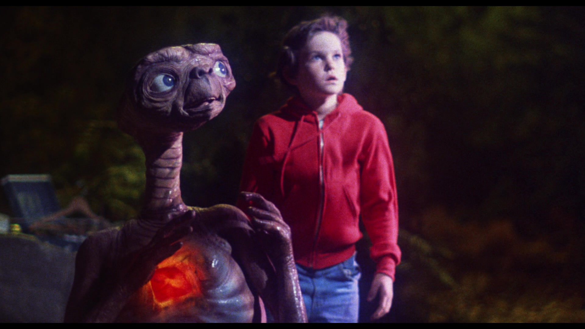 Elliott (Henry Thomas) and E.T. (Pat Welsh/Steven Spielberg/Kayden Green) watch as the mothership approaches in E.T. the Extra-Terrestrial (1982), Universal Pictures