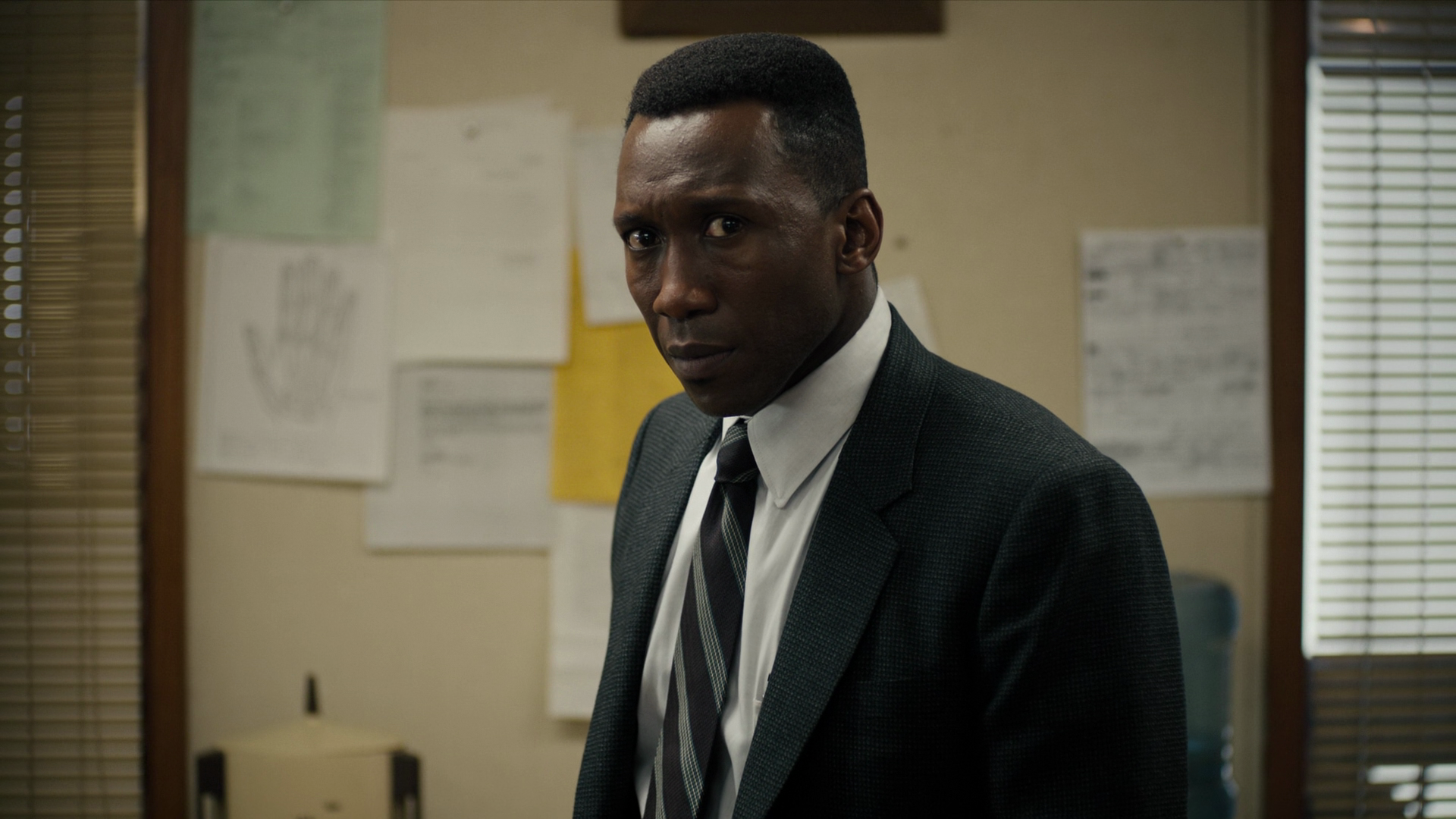 Detective Hays (Mahershala Ali) is shocked to find that he is the only one moved by Woodard's (Michael Greyeyes) death in True Detective Season 3 Episode 5 "If You Have Ghosts" (2019), HBO