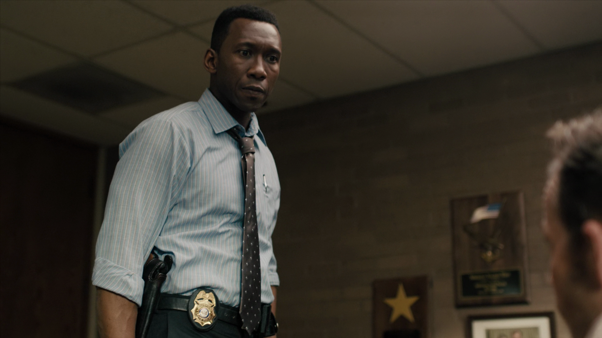 Detective Hays (Mahershala Ali) uncovers evidence of police corruption in True Detective Season 3 Episode 5 "If You Have Ghosts" (2019), HBO