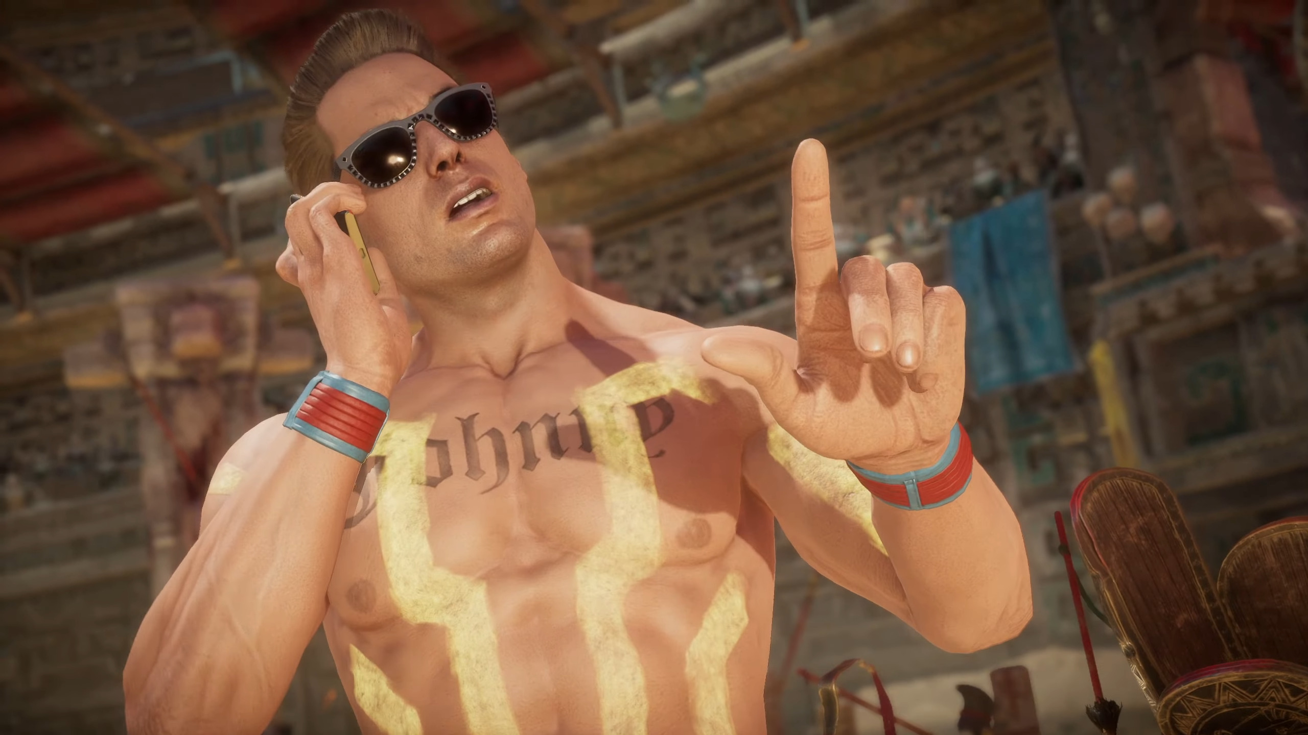 Johnny Cage (Andrew Bowen) takes a call from his agent in Mortal Kombat 11 (2019), NetherRealm Studios