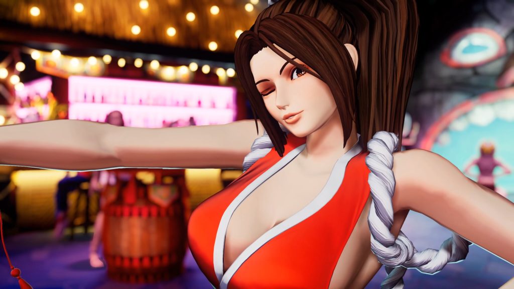 Mai Shiranui (Ami Koshimizu) gives a wink to her beaten opponent in King of Fighters XV (2022), SNK