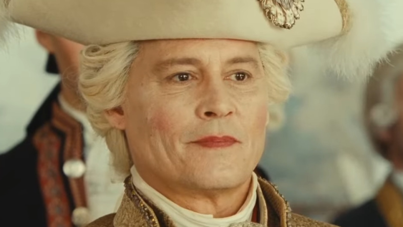 Louis XV (Johnny Depp) is stricken by Jeanne du Barry (Maïwenn) in Jeanne du Barry (2023), La Pacte