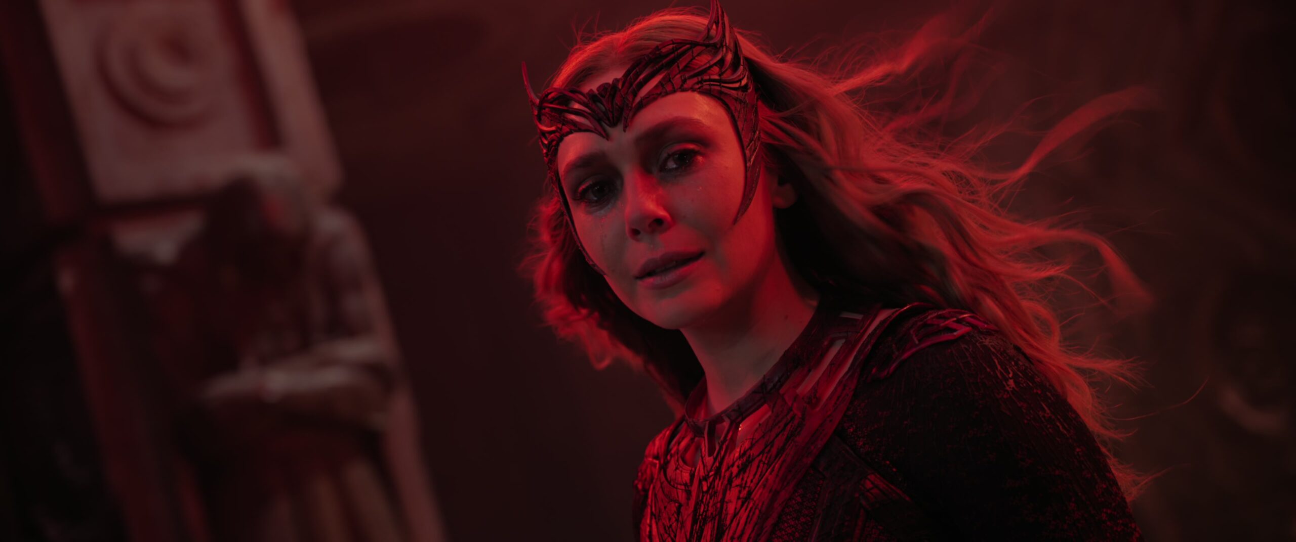 The Scarlet Witch (Elizabeth Olsen) realizes the futility of her pursuits in Doctor Strange in the Multiverse of Madness (2022), Marvel Entertainment