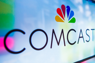 The company logo on a screen via Comcast