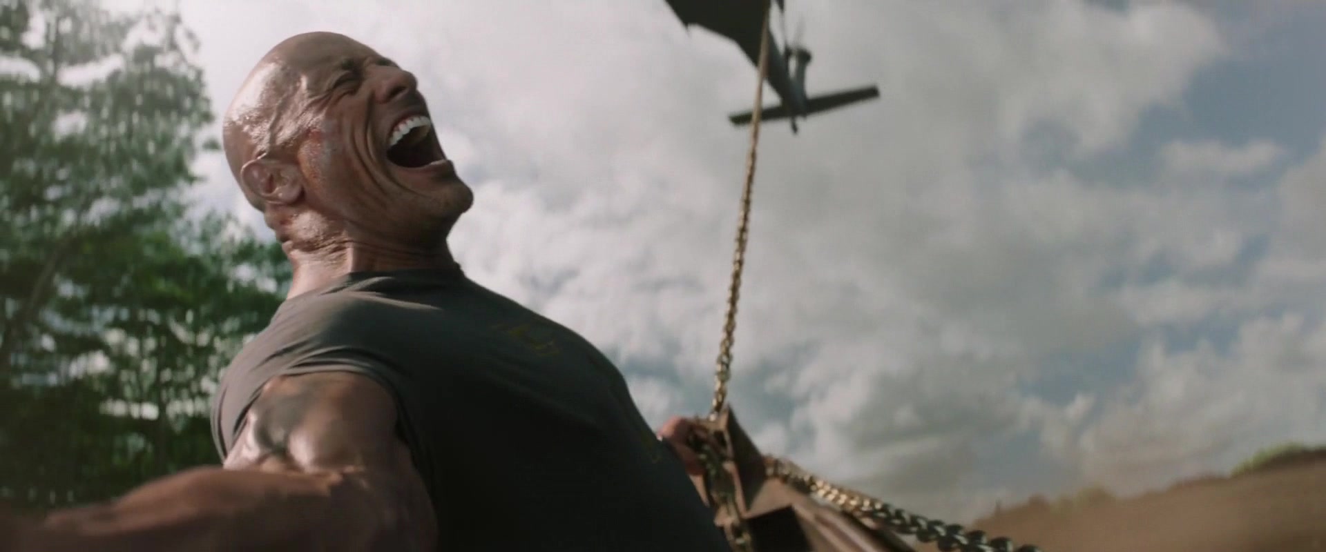 Lucas Hobbs (Dwayne 'The Rock' Johnson) takes hold of a helicopter in Fast & Furious Presents: Hobbs & Shaw (2019), Universal Pictures