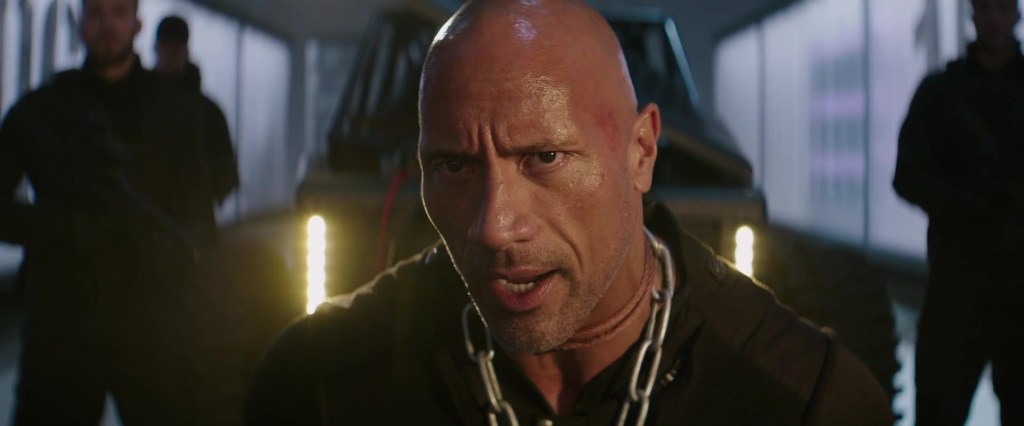 Lucas Hobbs (Dwayne 'The Rock' Johnson) finds himself in chains in Fast & Furious Presents: Hobbs & Shaw (2019), Universal Pictures