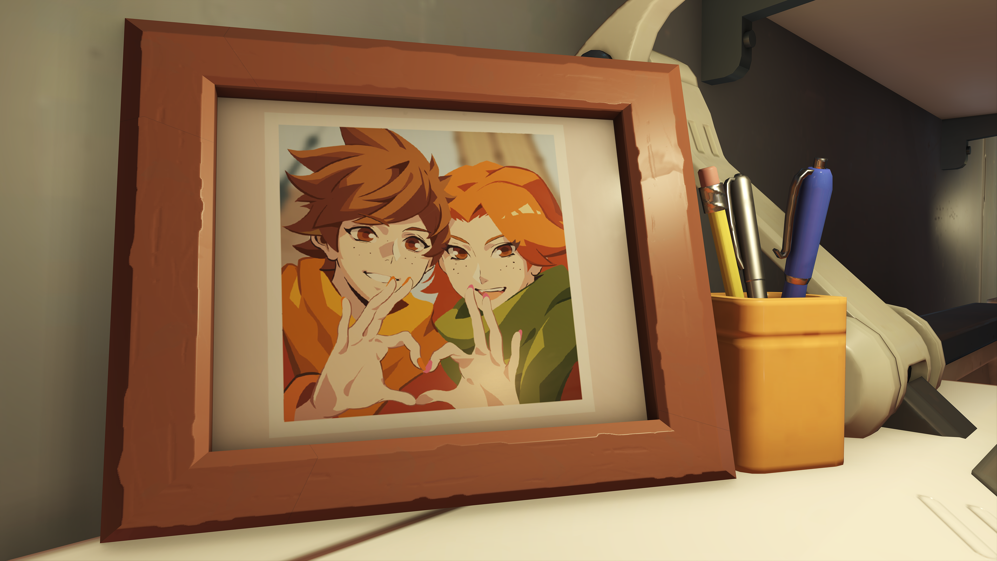 A photo of Tracer (Cara Theobold) and her girlfriend Emily appears in Watchpoint: Gibraltar as part of Pride Month celebrations in Overwatch 2 (2022), Blizzard Entertainment