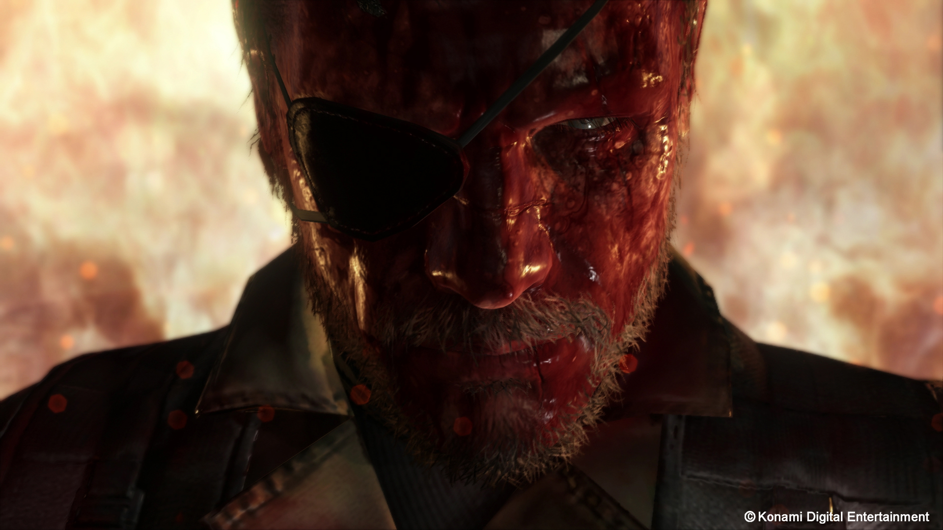 Big Boss (Kiefer Sutherland/Akio Ōtsuka) covered in blood and backed by flames in Metal Gear Solid V: The Phantom Pain (2015), Konami