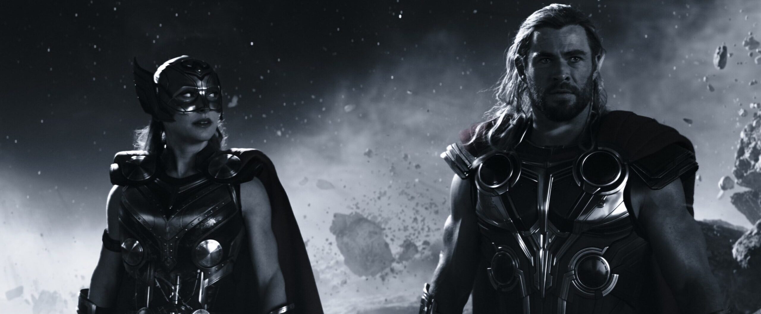 Thor (Chris Hemsworth) and Jane Foster (Natalie Portman) take on Gorr (Christian Bale) in Thor: Love and Thunder (2022), Marvel Entertainment 