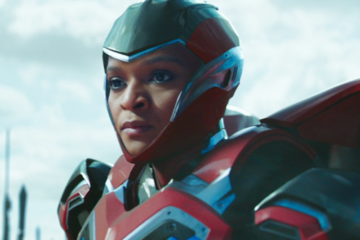 Riri Williams (Dominique Thorne) listens on as Shuri (Letitia Wright) declares victory in Black Panther: Wakanda Forever (2022), Marvel Entertainment