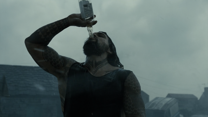 Arthur Curry (Jason Momoa) drinking in Zack Snyder's Justice League (2021), Warner Bros. Pictures