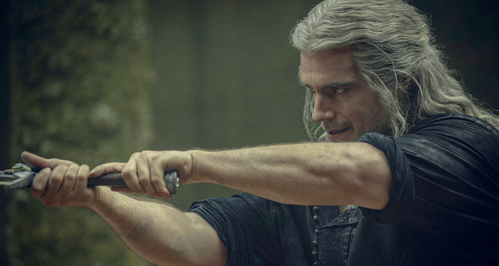 Geralt (Henry Cavill) draws his blade in The Witcher Season 3 Episode 4 "The Invitation" (2023), Netflix