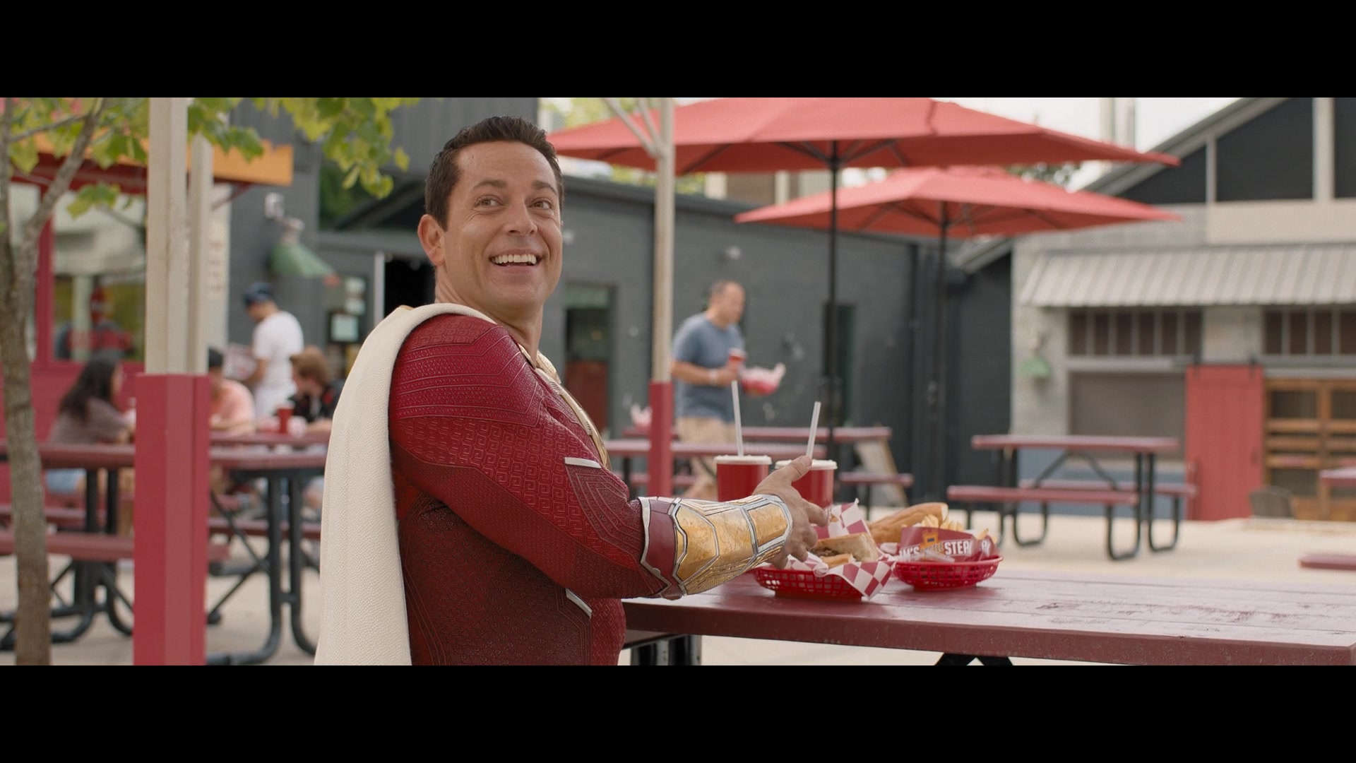 Shazam (Zachary Levi) prepares for a lunch meeting in Shazam! Fury of the Gods (2023), Warner Bros. Pictures