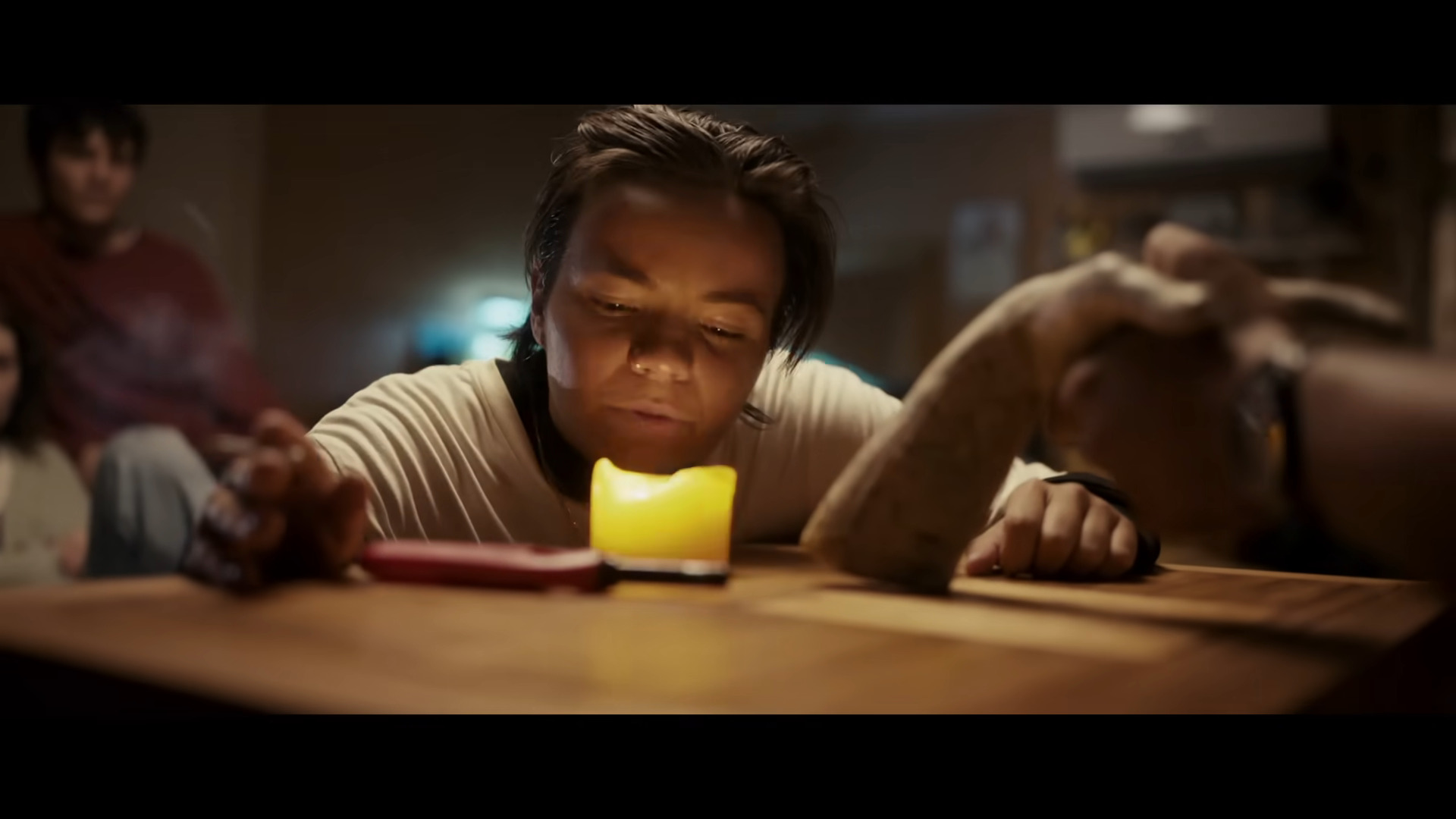 Hayley (Zoe Terakes) blows out a ceremonial candle in Talk to Me (2023), A24