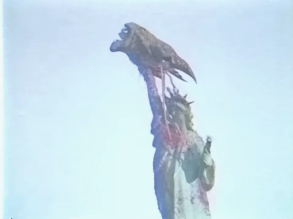 Gryphon's head spiked on Lady Liberty