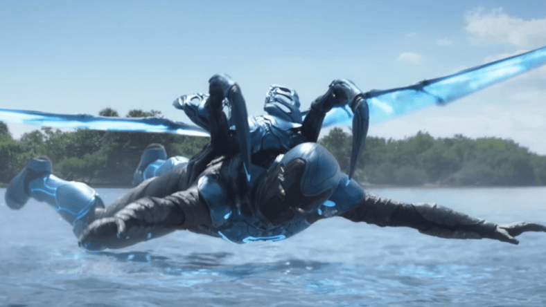 Jamie Reyes (Xolo Maridueña) breaks his fall in Blue Beetle (2023), DC Studios