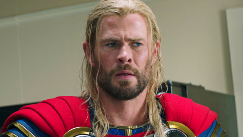 Thor (Chris Hemsworth) receives some bad news in Thor: Love and Thunder (2022), Marvel Entertainment