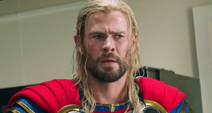 Thor (Chris Hemsworth) receives some bad news in Thor: Love and Thunder (2022), Marvel Entertainment