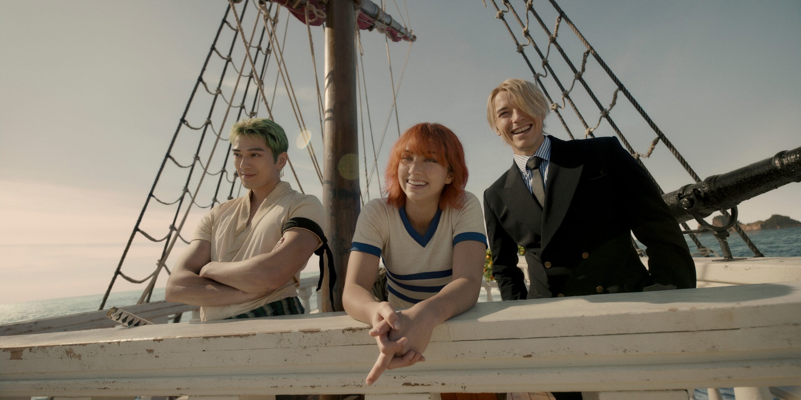 One Piece. (L to R) Mackenyu Arata as Roronoa Zoro, Emily Rudd as Nami, Taz Skylar as Sanji in season 1 of One Piece. Cr. Courtesy of Netflix © 2023