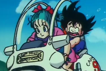 Bulma (Hiromi Tsuru) takes a young Goku (Masako Nozawa) for his first motorcycle ride in Dragon Ball Episode 1 "Bulma and Son Goku" (1986), Toei Co. Ltd.