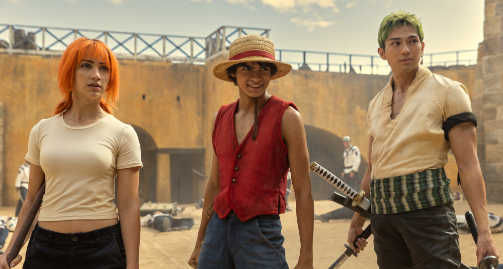 One Piece. (L to R) Emily Rudd as Nami, Iñaki Godoy as Monkey D. Luffy, Mackenyu Arata as Roronoa Zoro in season 1 of One Piece. Cr. Casey Crafford/Netflix © 2023