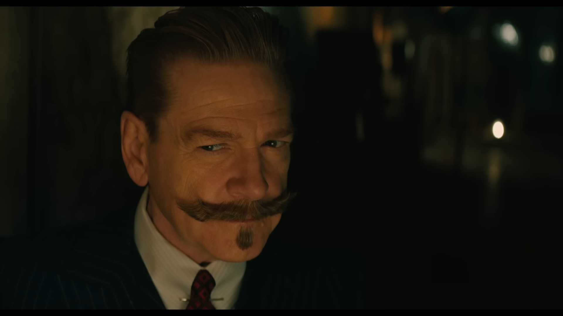 Hercule Poirot (Kenneth Branagh) is unsure of the seance's effects in A Haunting in Venice (2023), 20th Century Studios