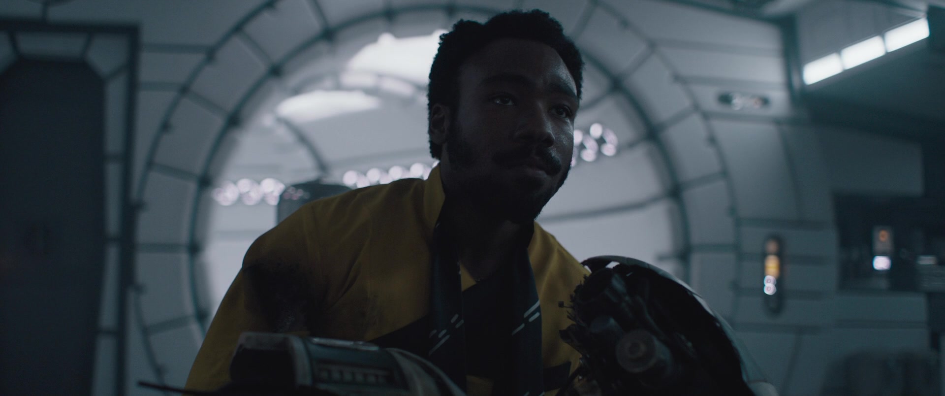 Lando Calrissian (Donald Glover) mourns the death of L3-37 (Phoebe Waller Bridge) in Solo: A Star Wars Story (2018), Lucasfilm