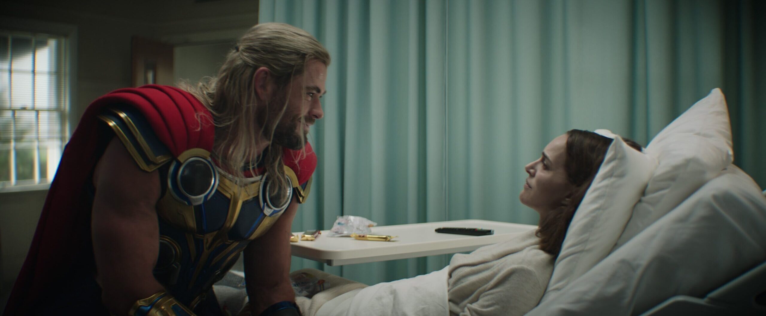 Thor (Chris Hemsworth) visits Jane Foster (Natalie Portman) during her stay at the local cancer ward in Thor: Love and Thunder (2022), Marvel Entertainment