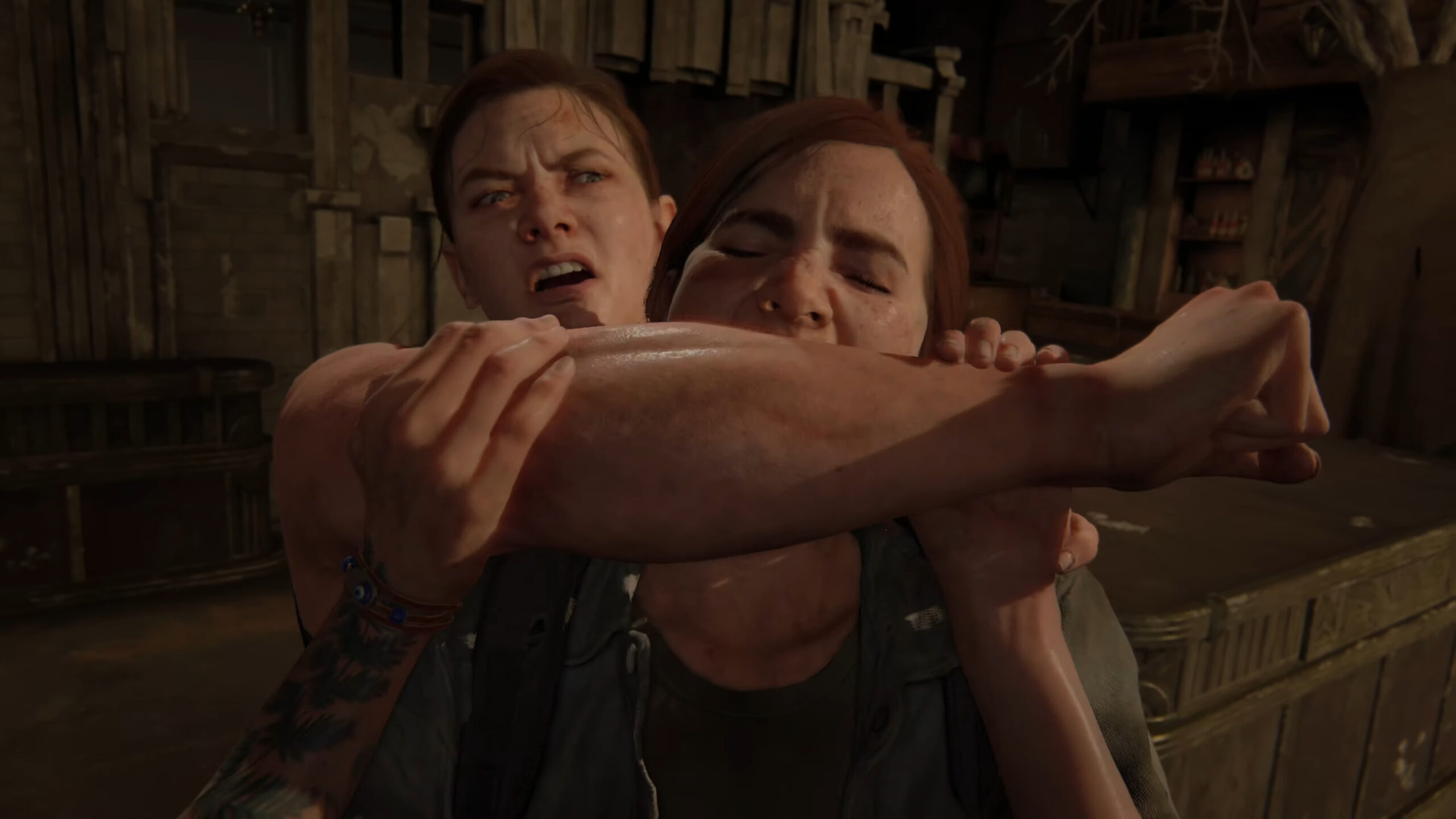 Ellie (Ashley Johnson) takes a bite out of Abby (Laura Bailey) in The Last of Us Part II (2020), Naughty Dog