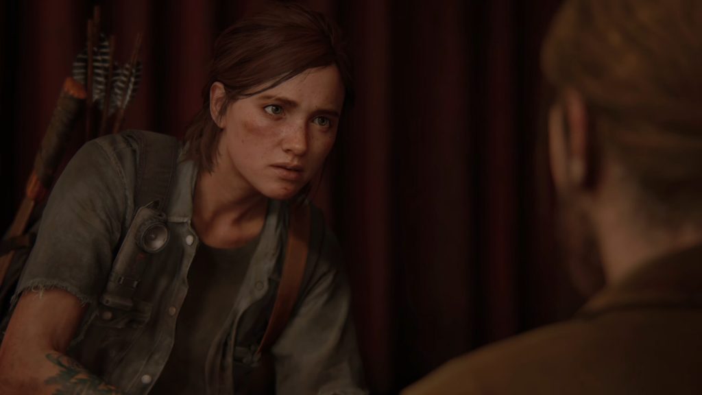 Ellie (Ashley Johnson) and Tommy (Jeffrey Pierce) debate the morality of letting Abby (Laura Bailey) live in The Last of Us Part II (2020), Naughty Dog