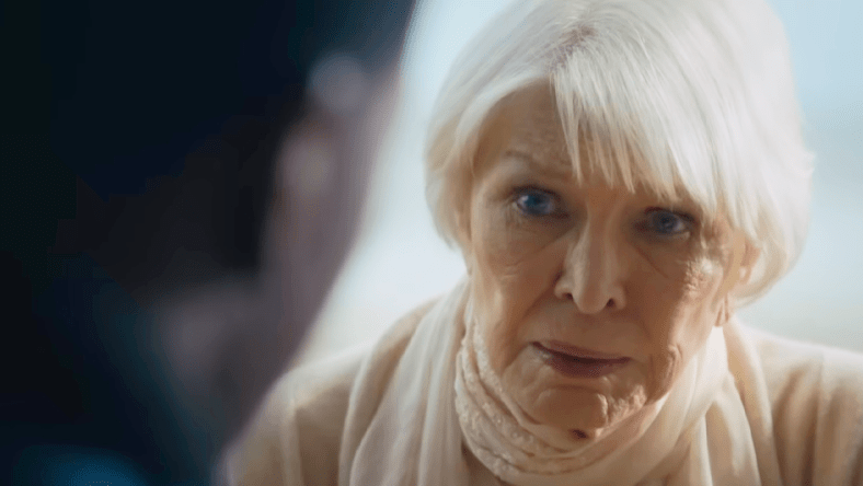 Chris MacNeil (Ellen Burstyn) opines to Victor Fielding (Leslie Odom Jr.) about why she was not allowed to see Regan's (Linda Blair) exorcism in The Exorcist: Believer (2023), Universal Pictures